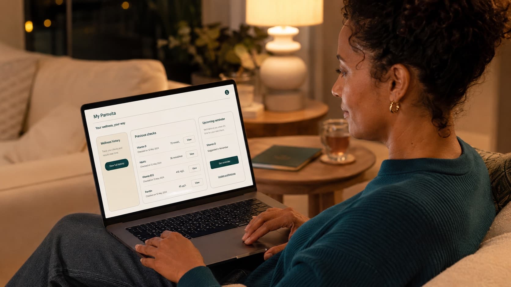 Customer viewing wellness check history and reminders on a laptop.